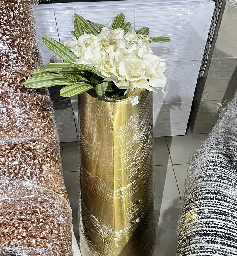 White Flowers in Gold Cylinder Vase image