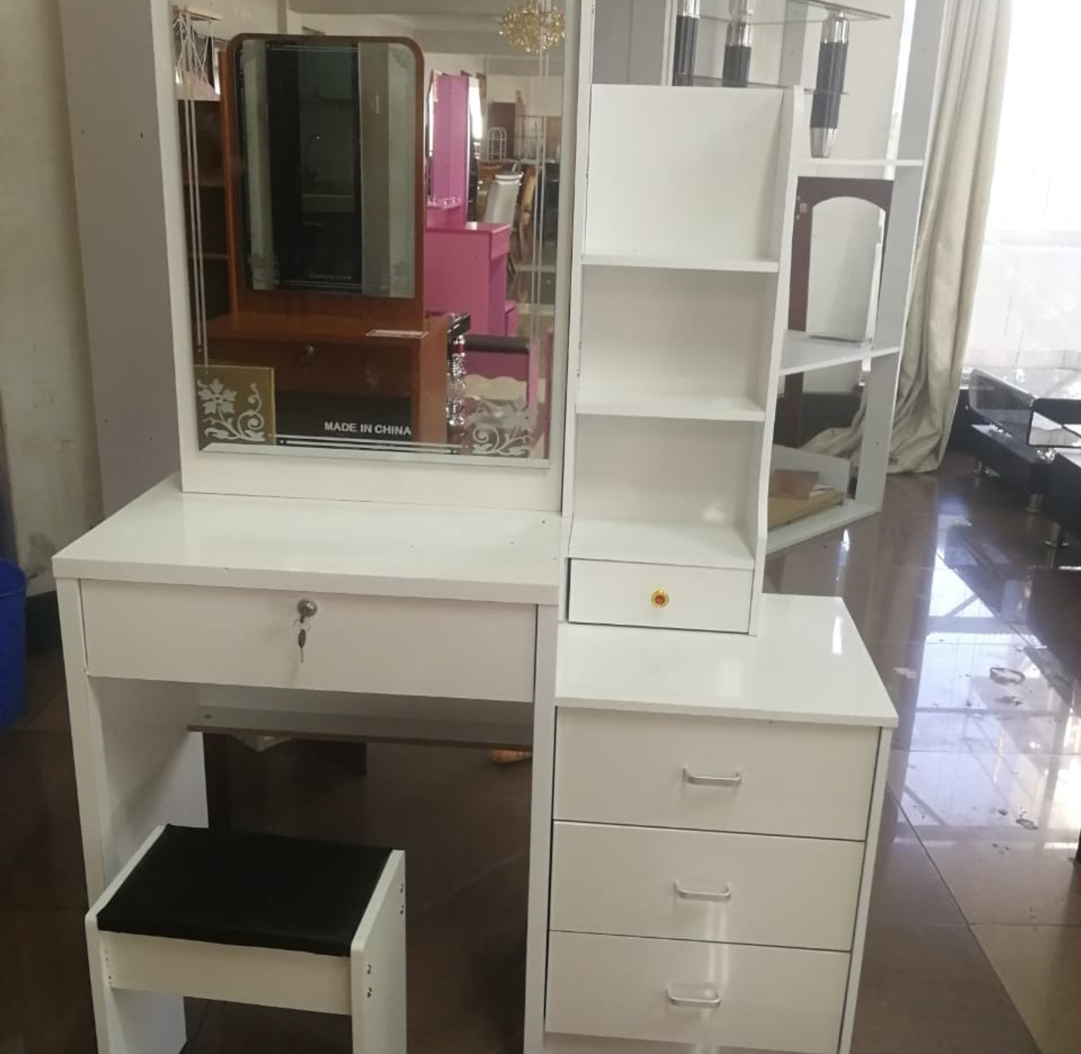 Dressing table with sliding mirror image
