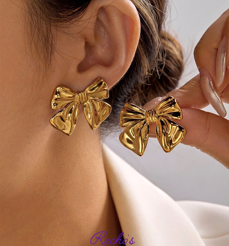 Gold bow earrings  image
