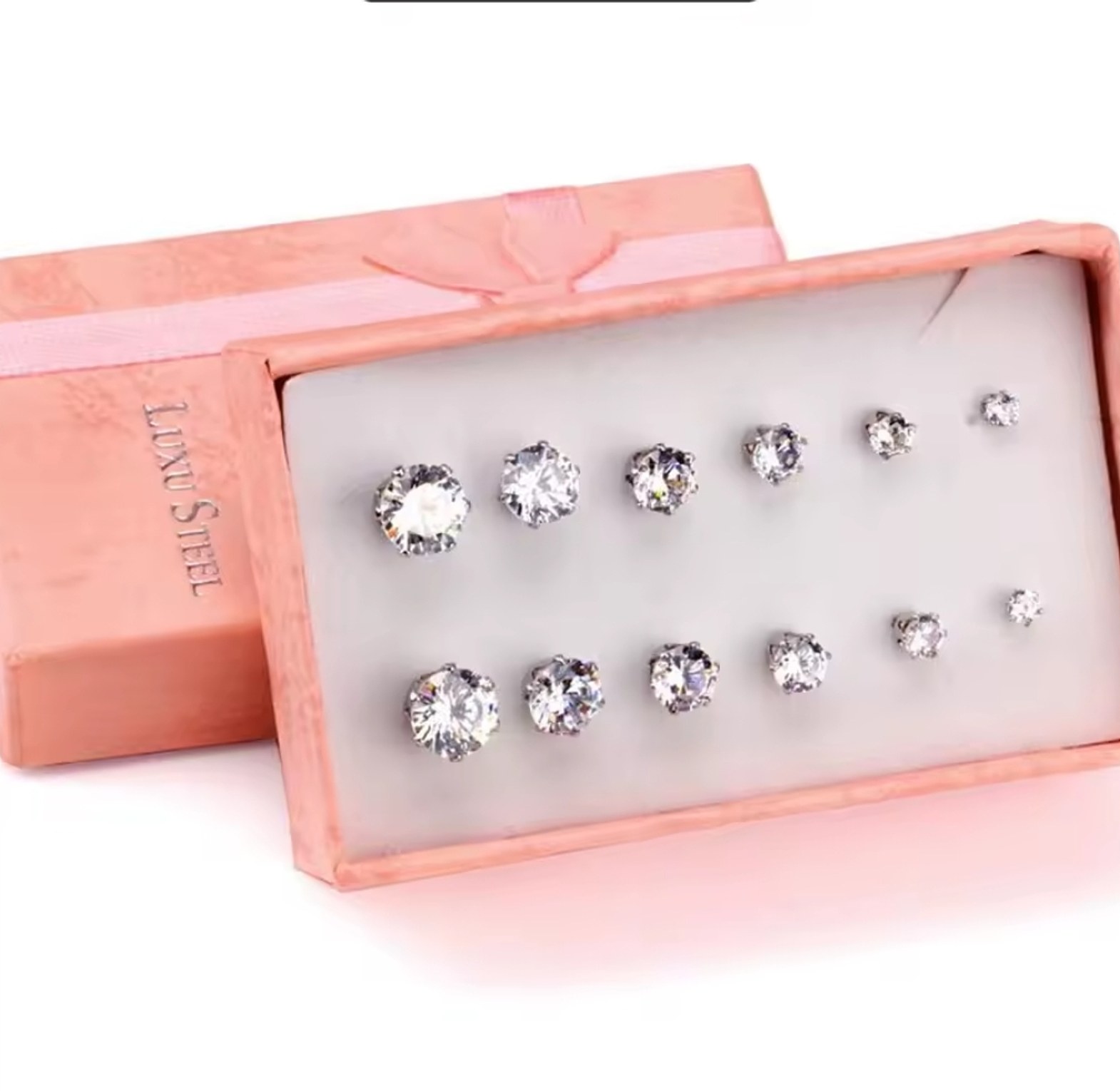 6 pairs of Small stainless steel, zirconia and studs. image