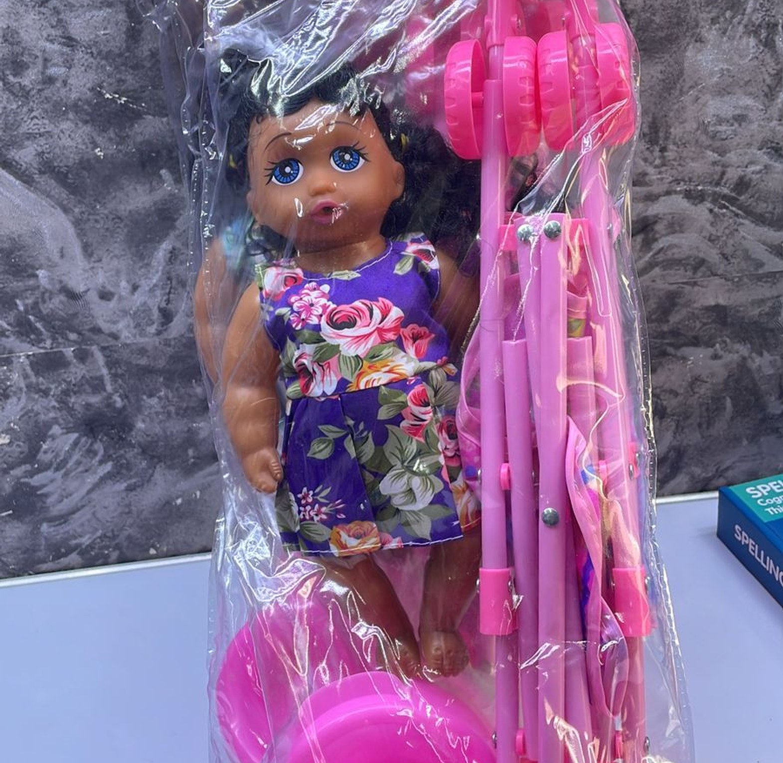 Doll plus a stroller  image