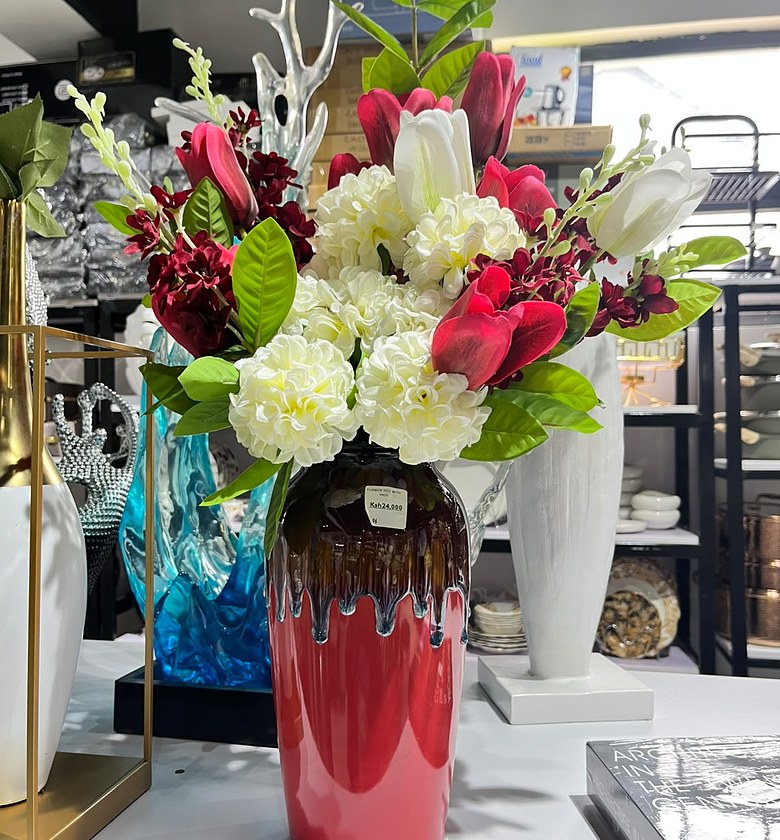 Red Floral Arrangement in Glass Vase image
