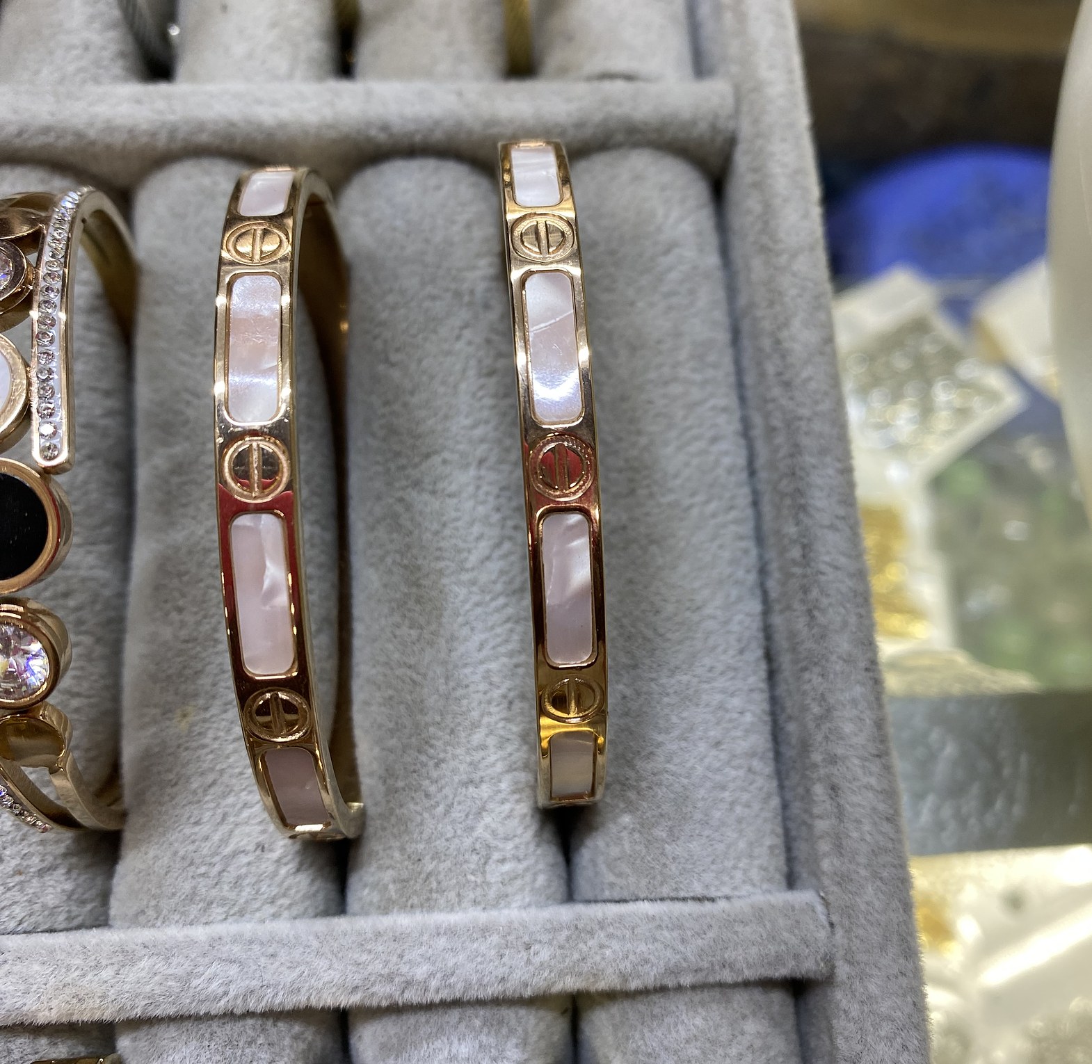 Gold love bracelet with a marble touch image
