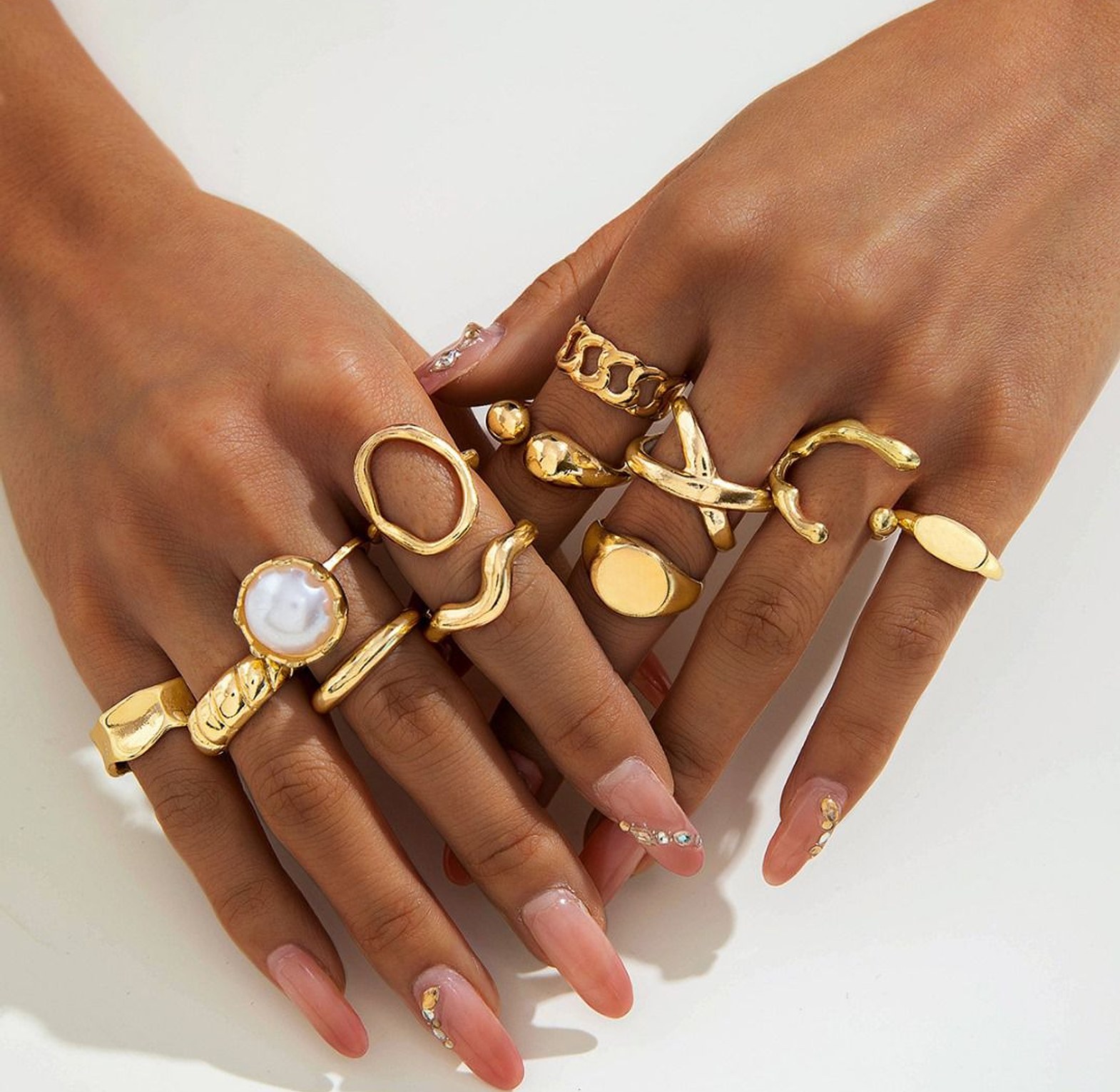 Statement gold-hued rings set image