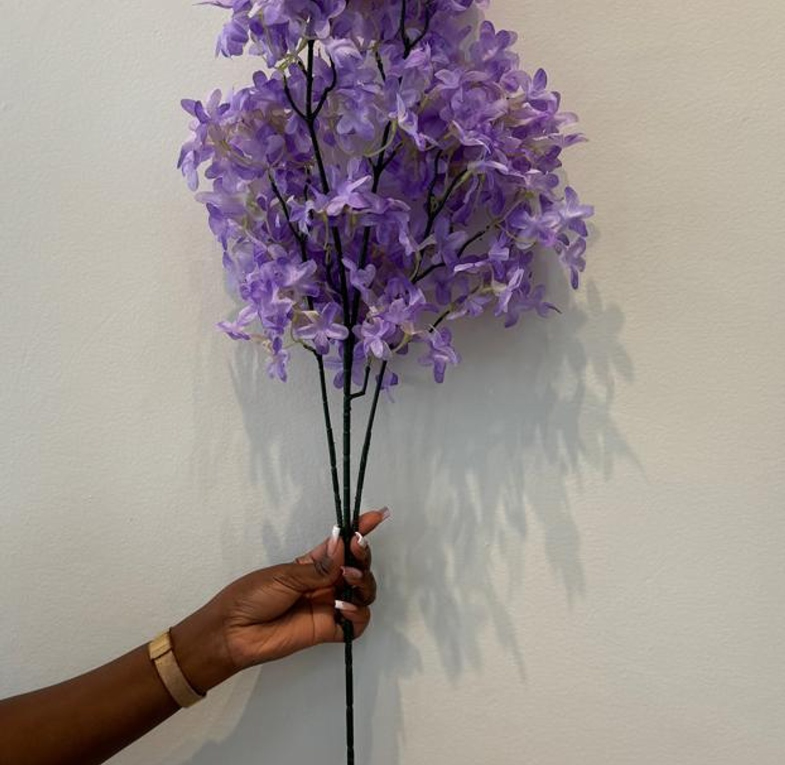  Faux lilac flowers.  image