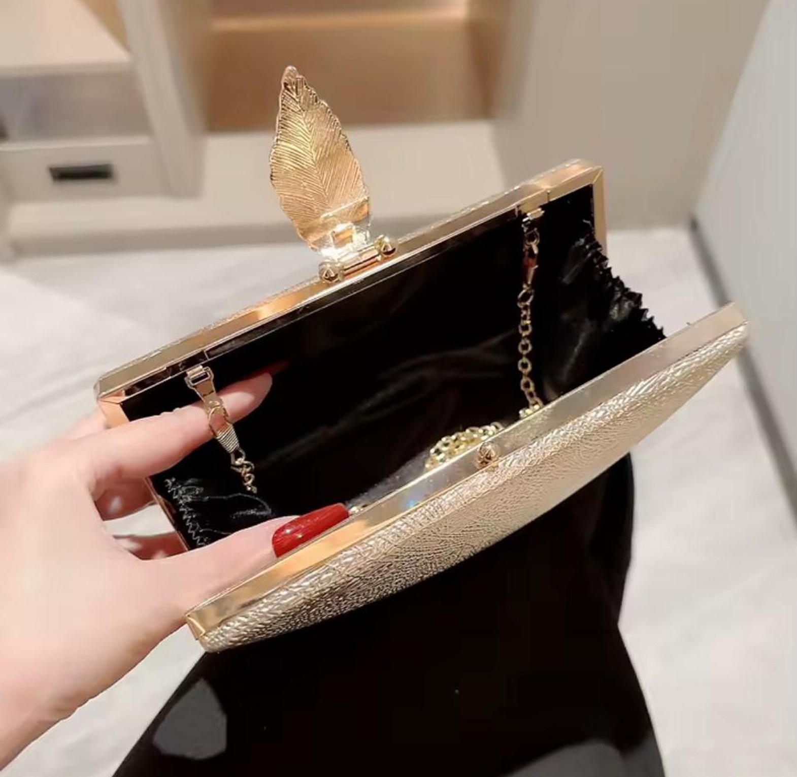 Gilded Leaf Textured Evening Clutch Bag image
