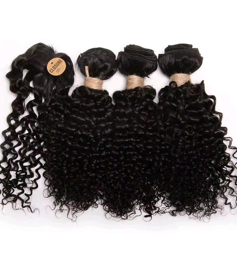 Natural Black Kinky curl human hair weave bundles with closure. 3 bundles 12 inches each and closure image