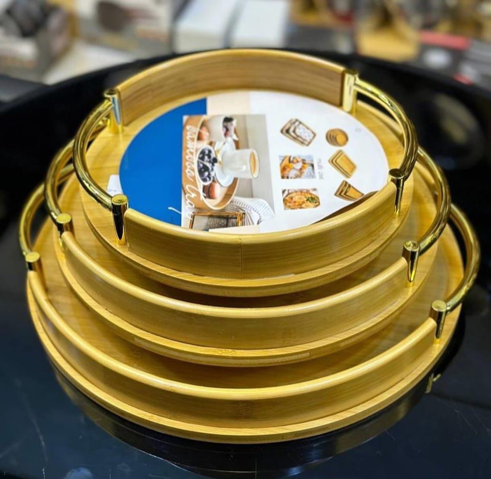 Nested Bamboo Serving Trays with Gilded Handles image