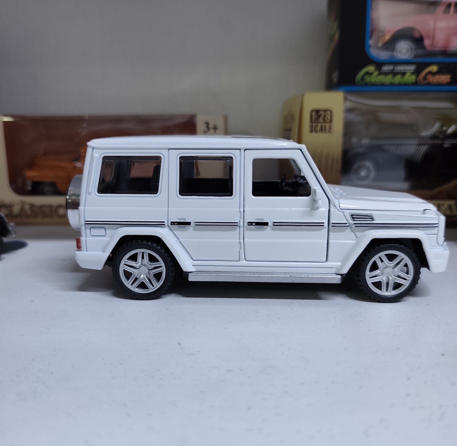 Mercedes Benz G-Wagon G63 Diecast Metal Toy Car 1:32 Scale Pull-Back Action Model with Opening Doors –  Gloss Finish image