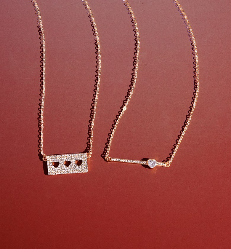 Dainty gold bar and heart pendant necklace image