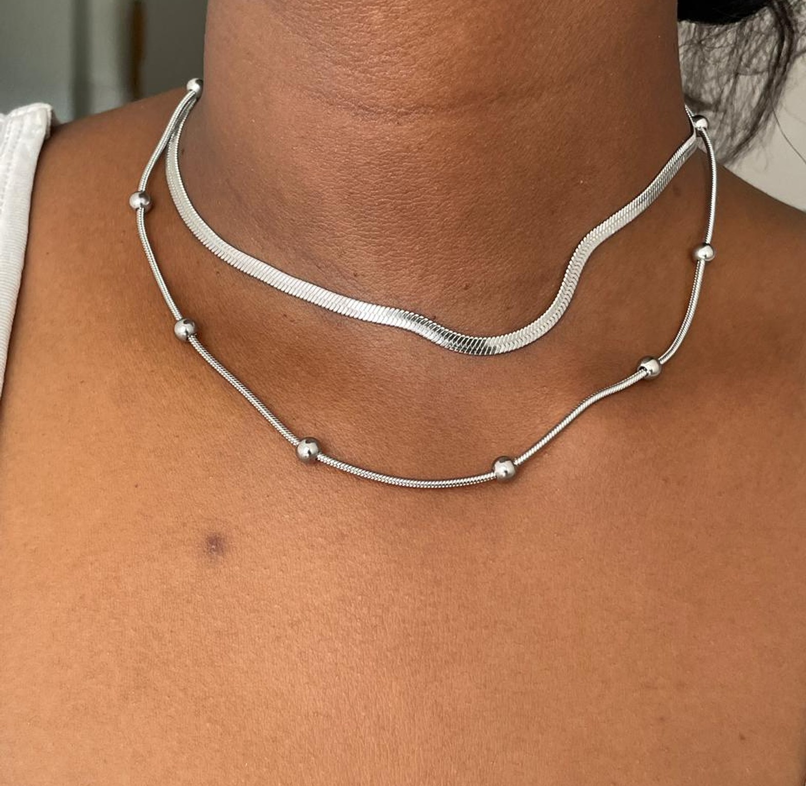 Sleek Dual-Layer Silver Necklace with Bead Accents image