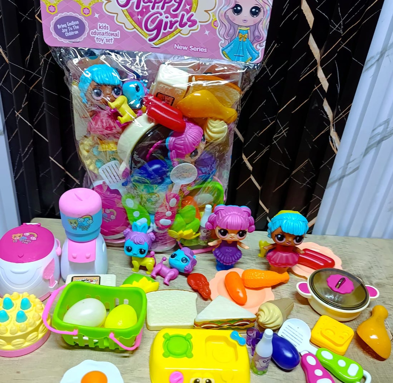 Happy girls kitchen set with plenty play items image