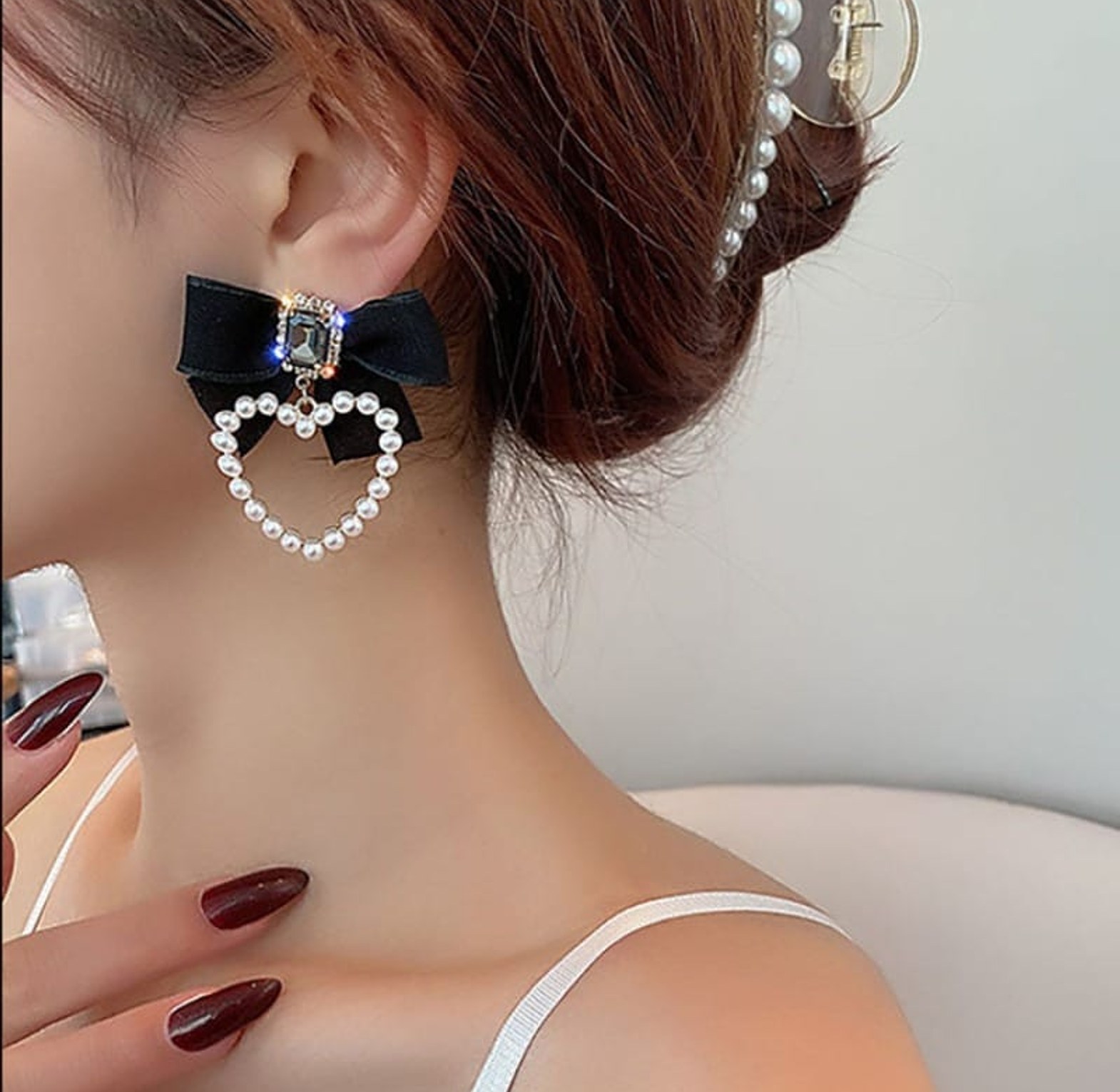 Crystal bow pearl earrings image
