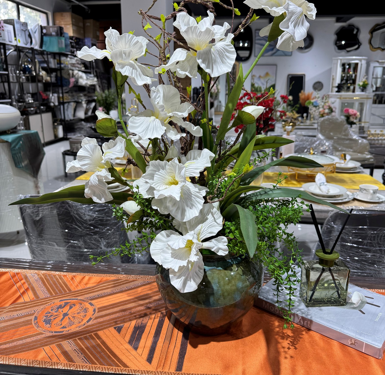 White iris in an earthy vase image
