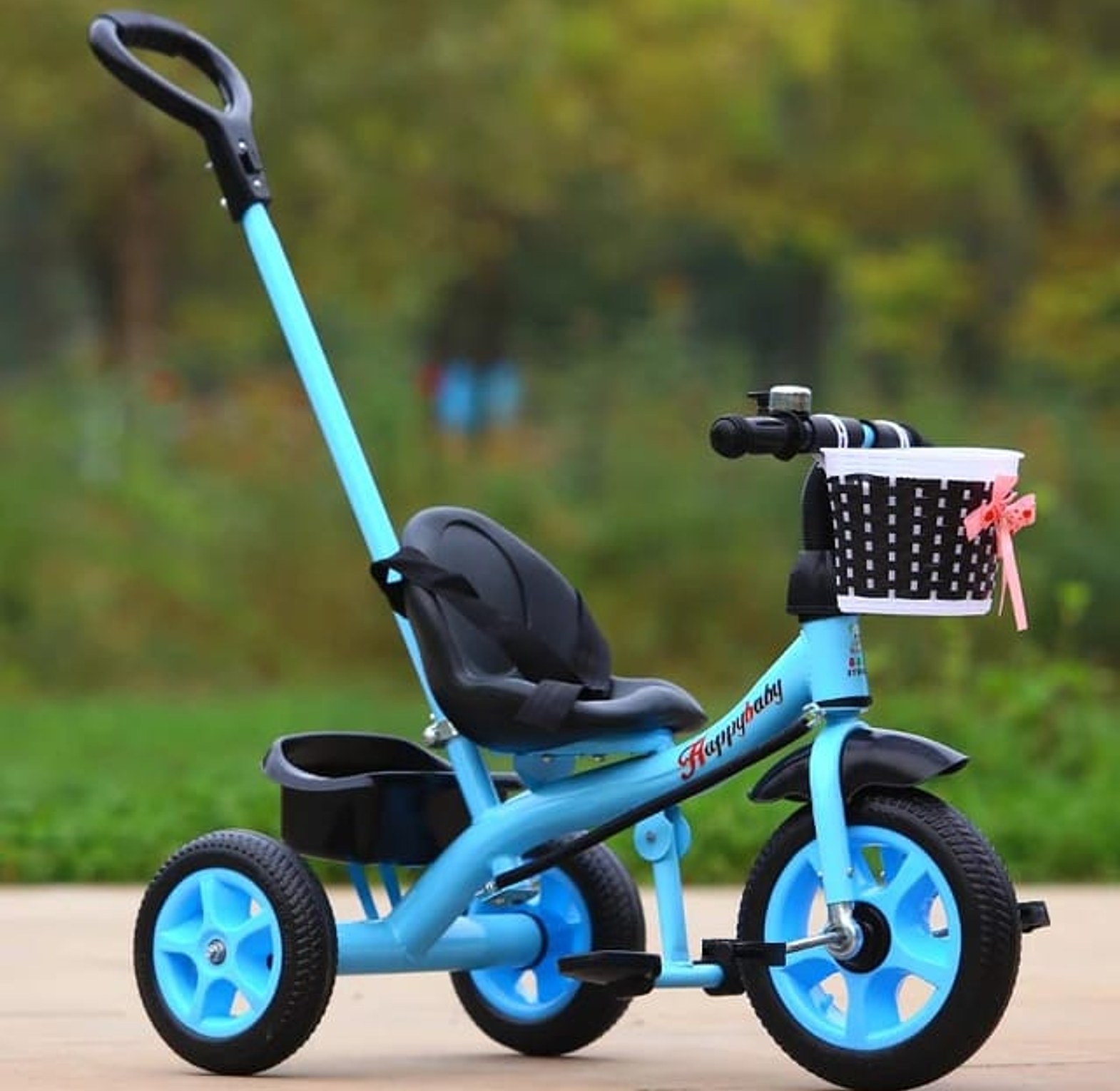 Tricycle.  KIDS TRICYLES WITH A PUSH HANDLE CHILDREN BICYCLES AGE 0 TO 4 YEARS With A Belt To Prevent  Your baby from Falling image