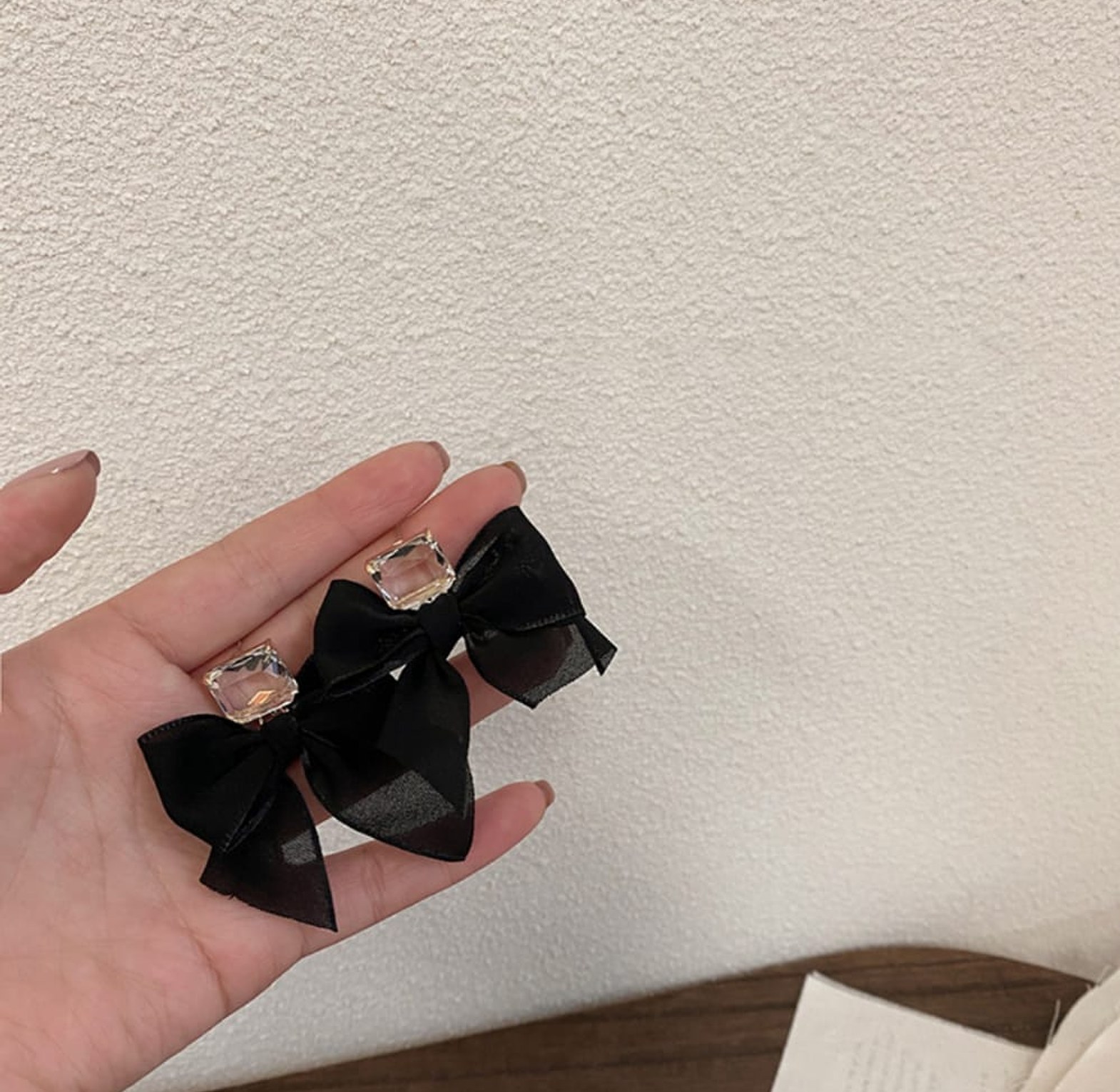 Black bow crystal earrings image