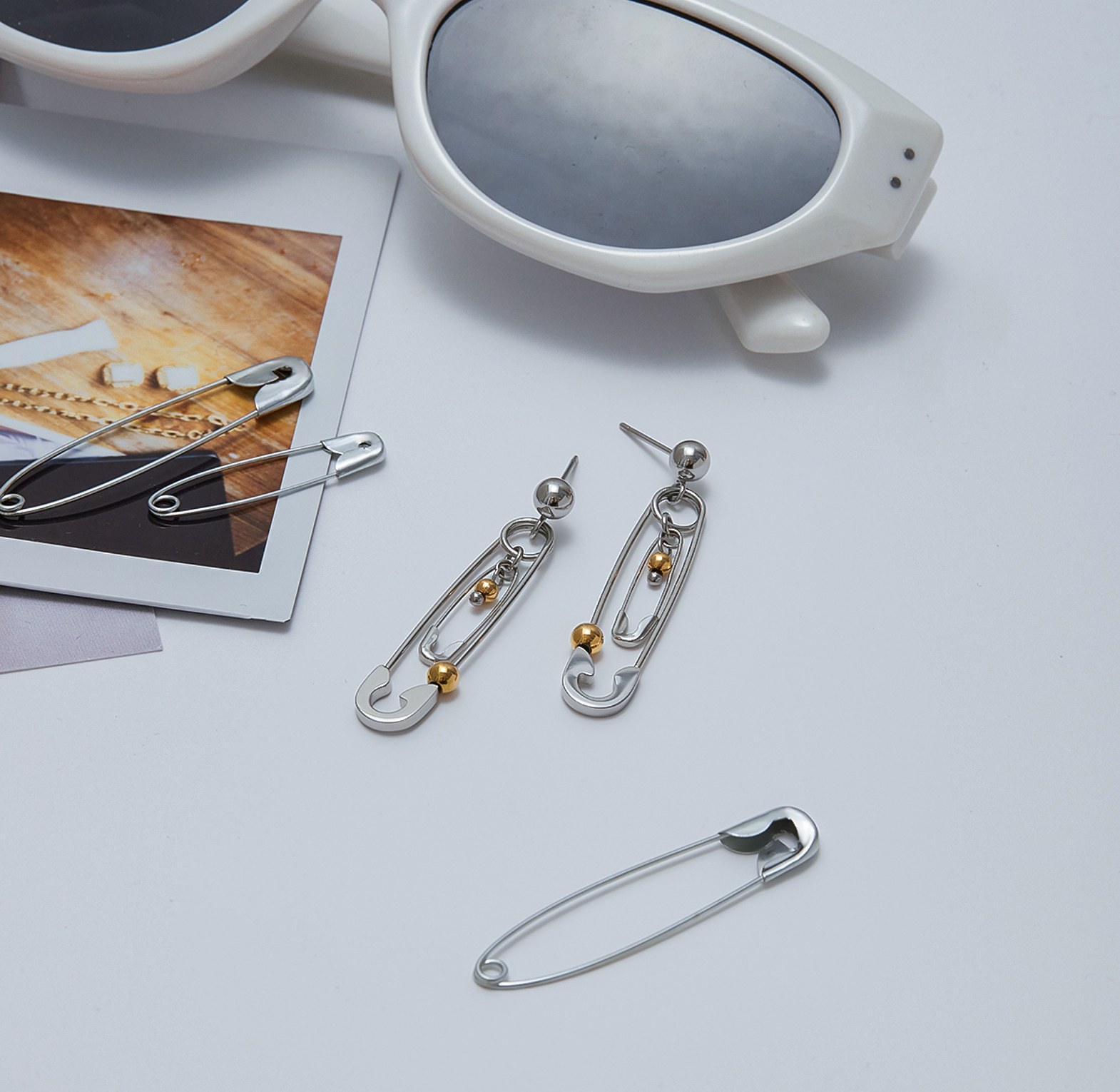 Safety pin drop earrings image