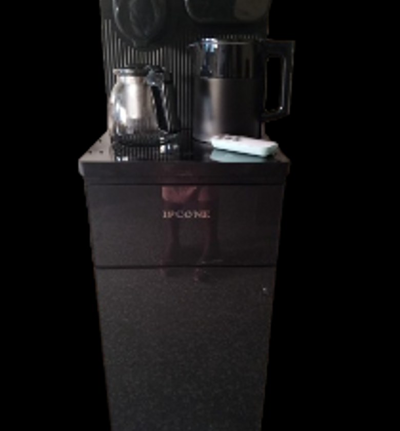 Water Dispenser. IPCONE Bottom Load Dispenser. Hot ,cold And Normal Features Woth A Kettle And A Coffee Maker Remote For Your Use At Your Confort. image