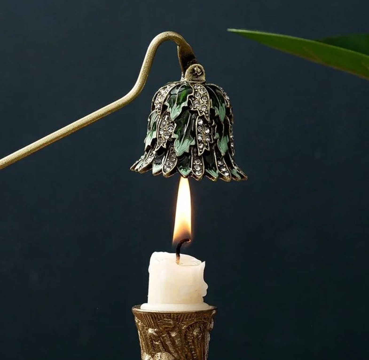 Antique candle snuffer image