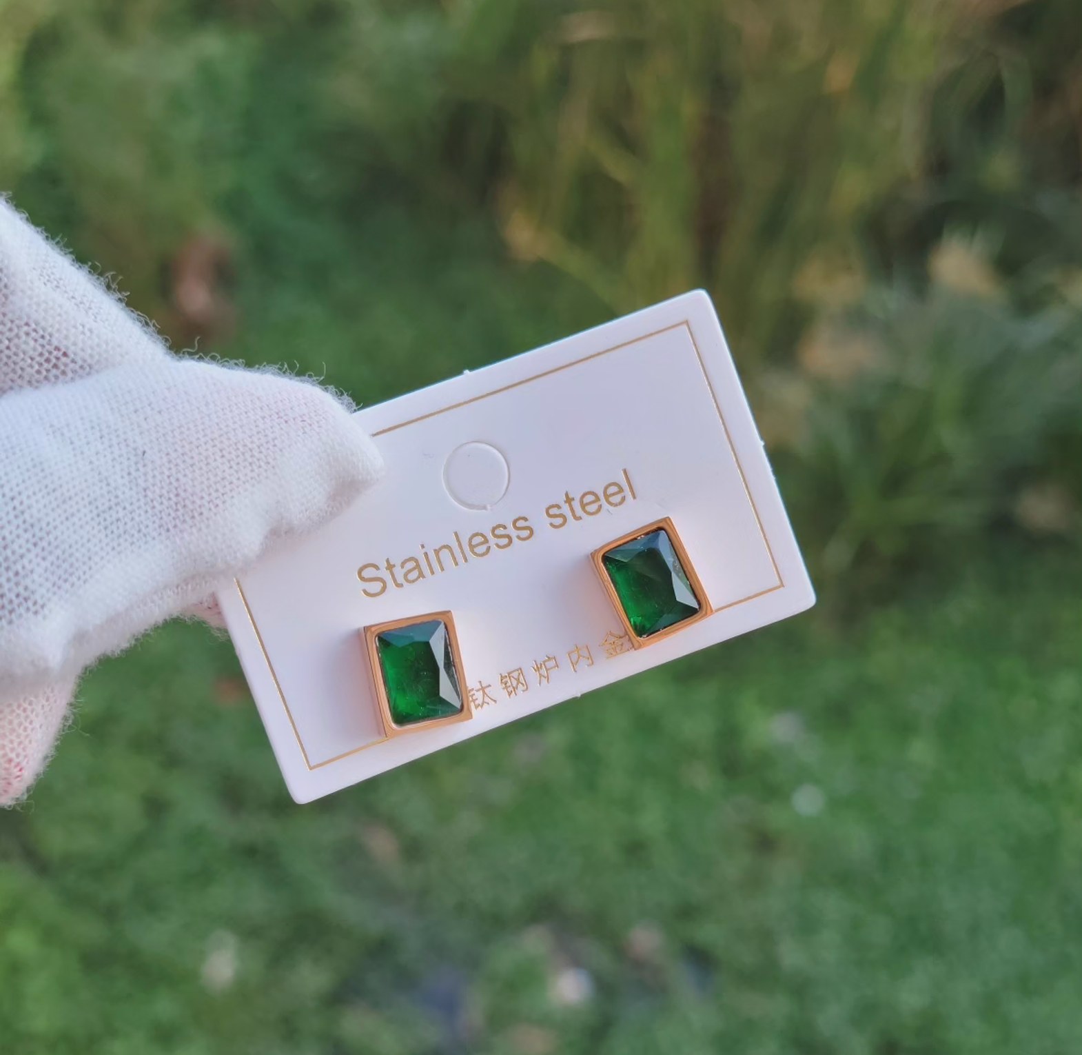Emerald green studs  image
