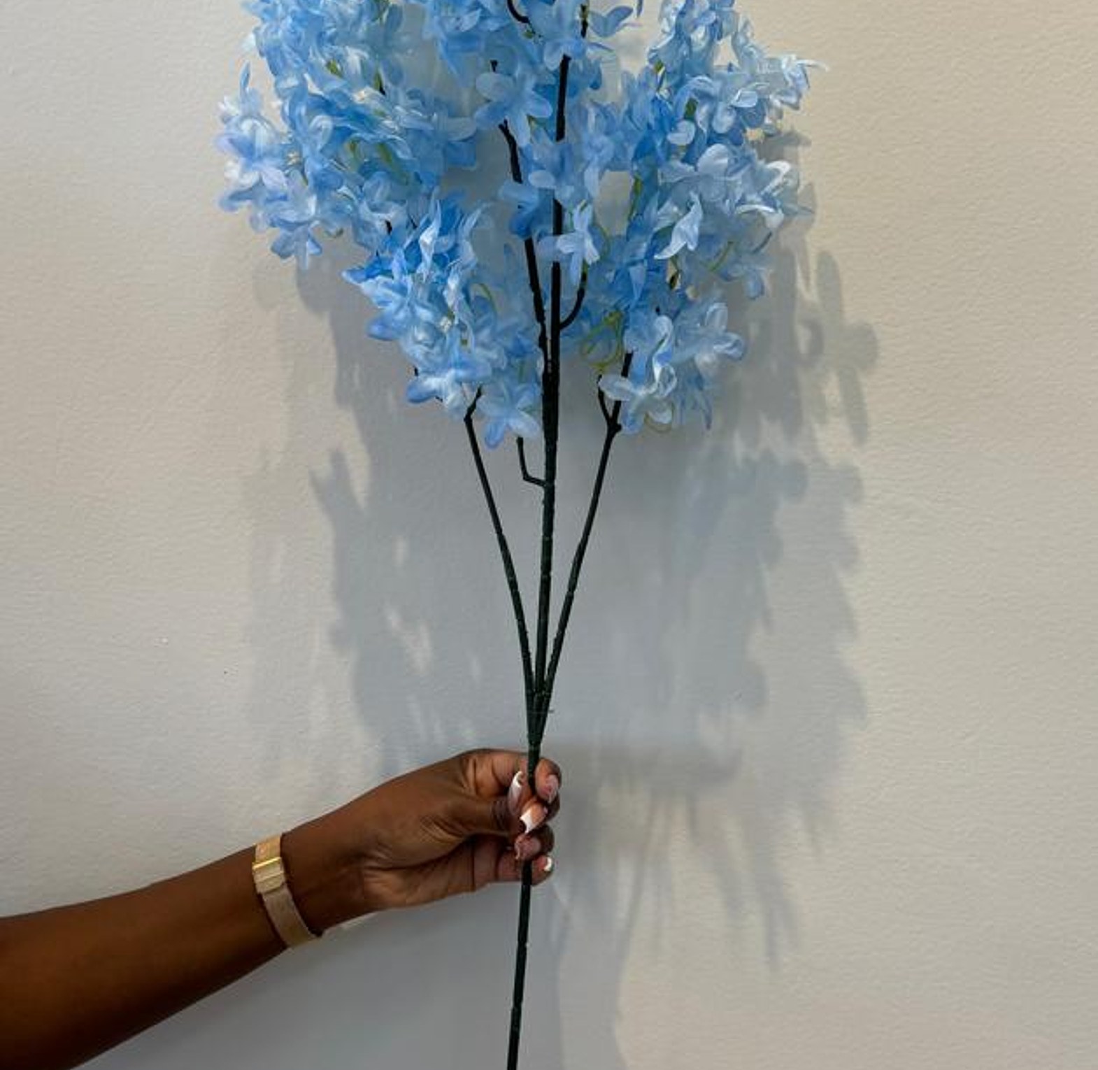  Faux lilac flowers.  image