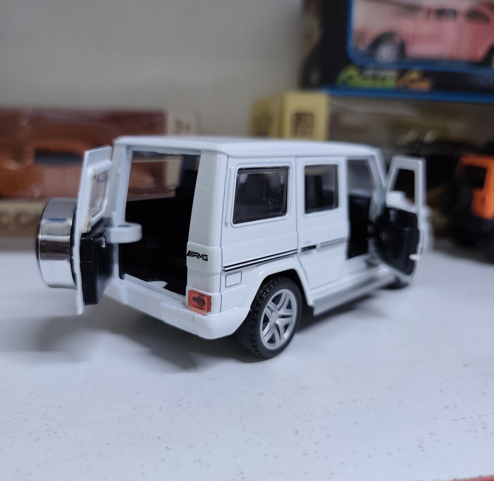 Mercedes Benz G-Wagon G63 Diecast Metal Toy Car 1:32 Scale Pull-Back Action Model with Opening Doors –  Gloss Finish image