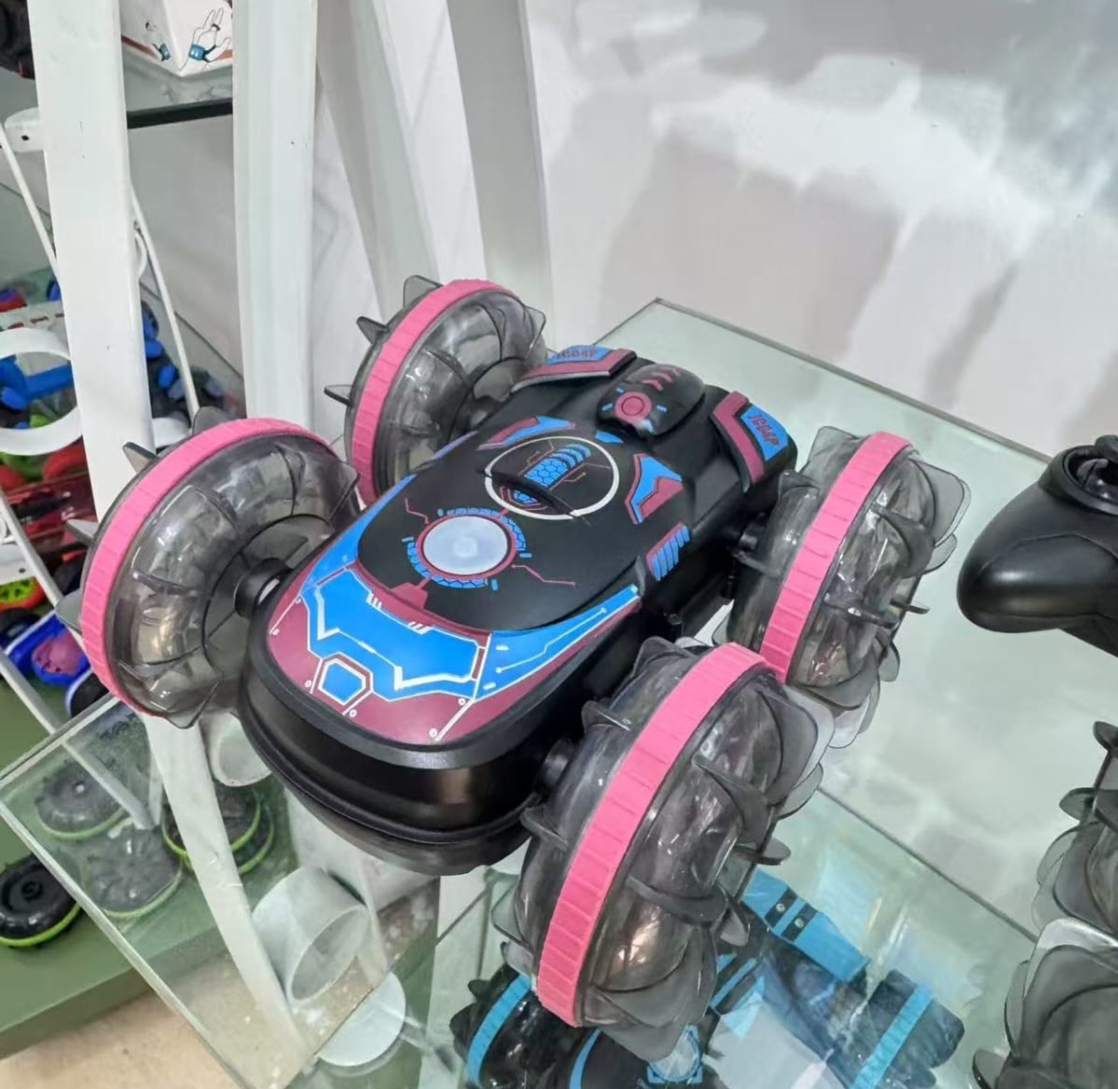 Amphibious All-Terrain RC Stunt Car, also referred to as a 2.4GHz Dual Control RC Car with Gesture Sensor.  image