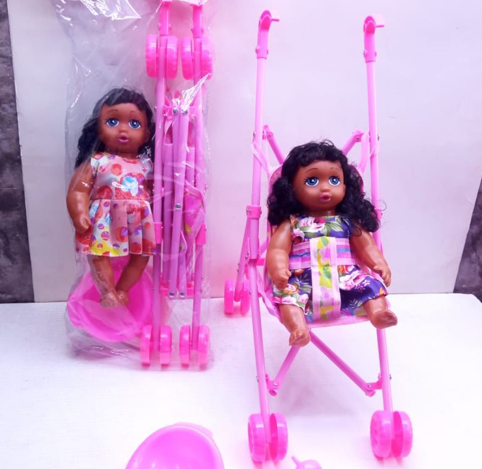 Doll plus a stroller  image