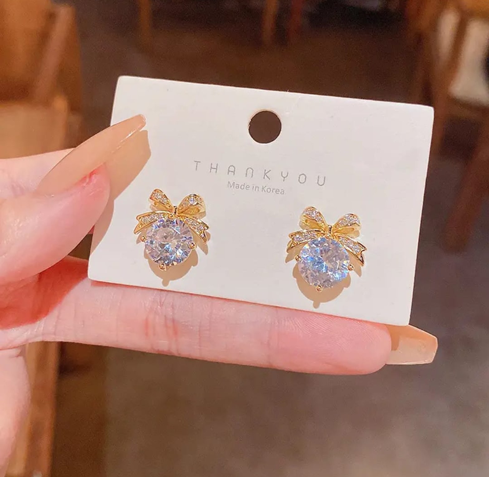 Dainty crystal bow earrings  image