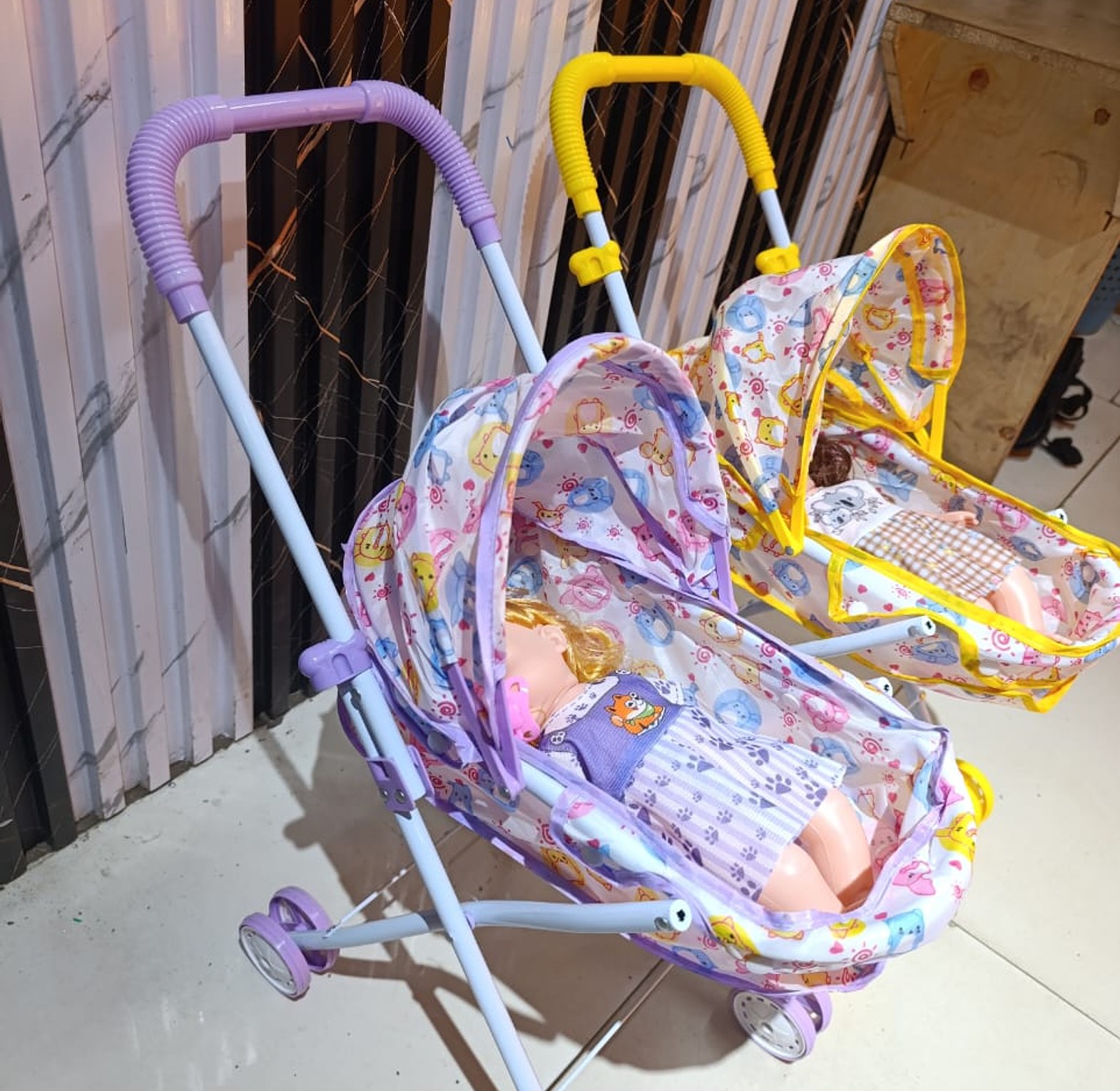 Kids stroller with doll  image