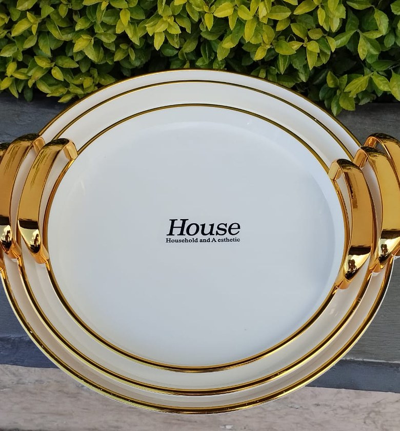 SERVING TRAYS. 3 pcs serving trays with gold crystals handle image