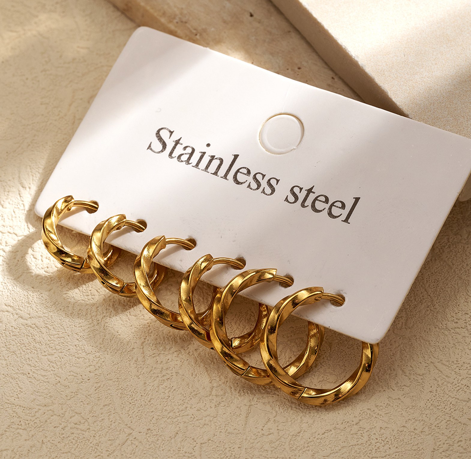 Spiral Infinity Hoops gold image