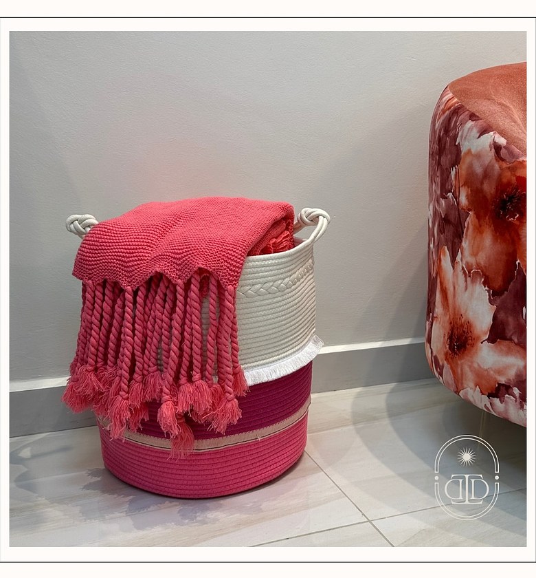 Shades of pink cotton rope basket with fringe. image