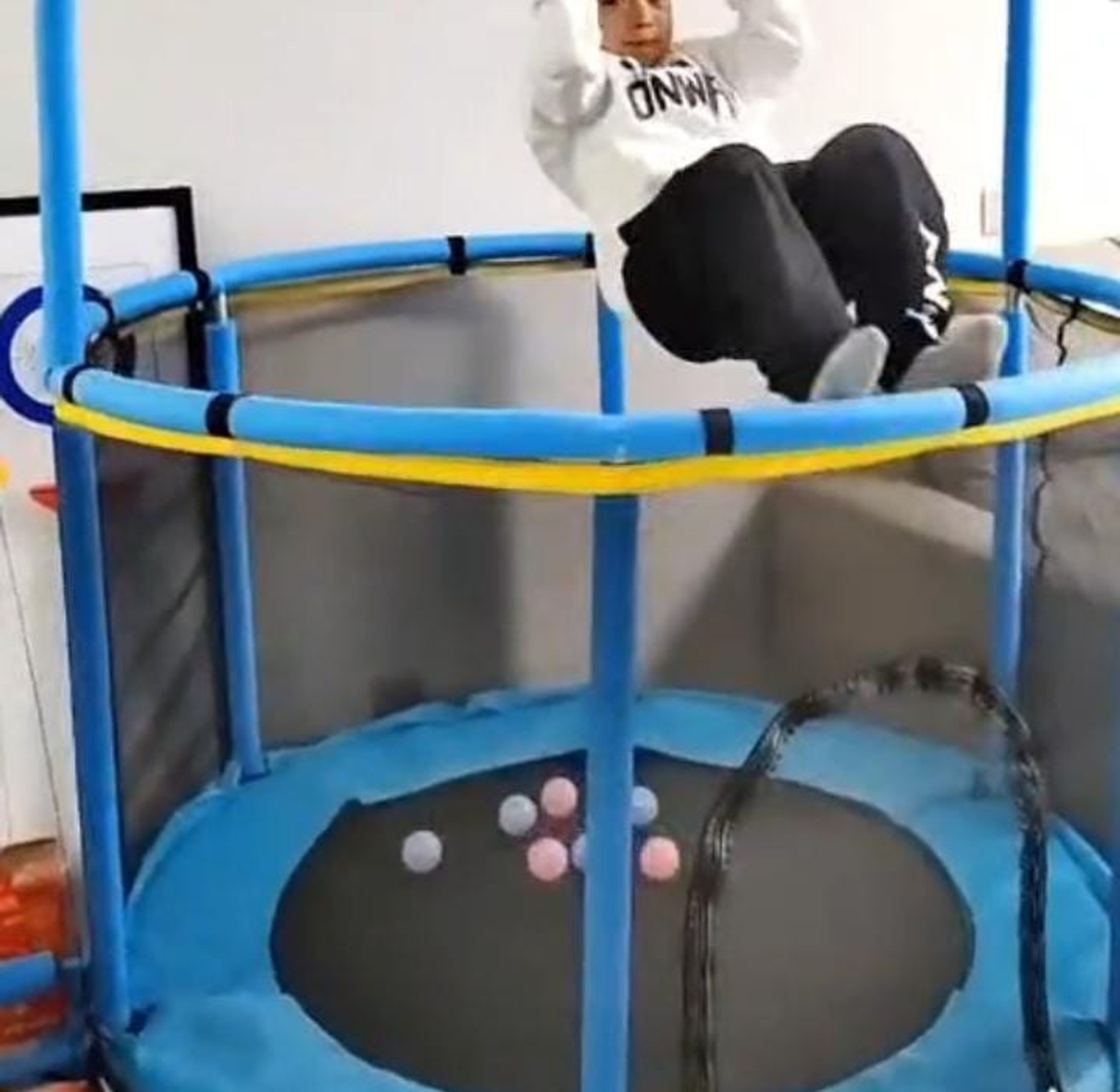 4FT Kids' Indoor/Outdoor Trampoline  with an integrated adjustable gymnastics bar{ Check out Video Below}  image