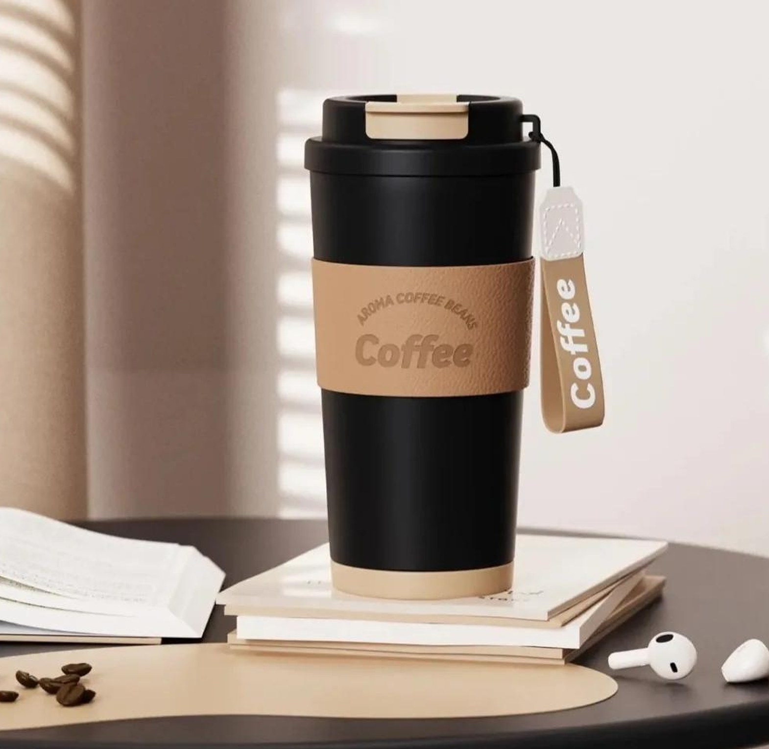 vacuum insulated stainless steel Coffee mug with a leather sleeve and a straw image