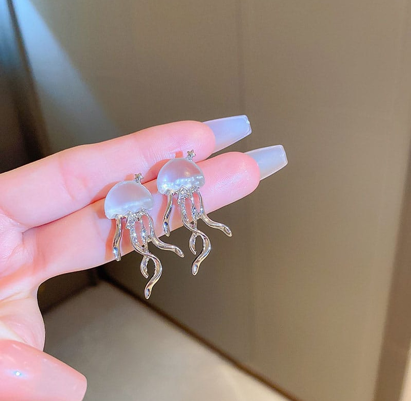 Silver jelly fish earrings image