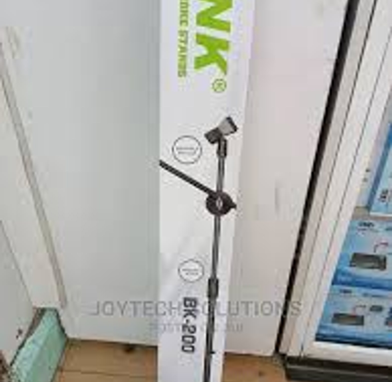  Microphone Floor Stand.  Professional adjustable microphone floor stand designed for use in studios, on stages, and in other settings where hands-free microphone positioning is needed image