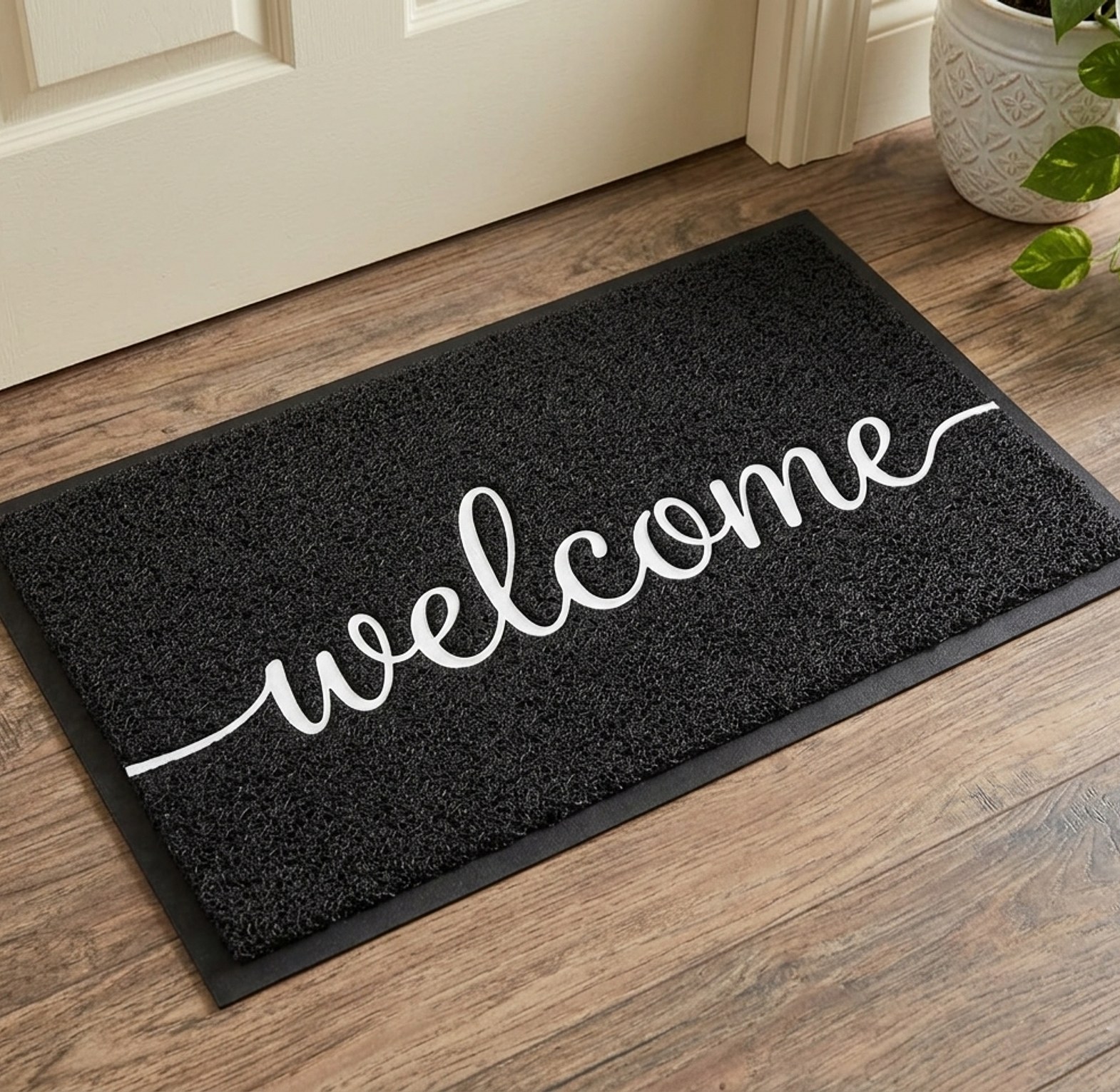 Black welcome door mat image