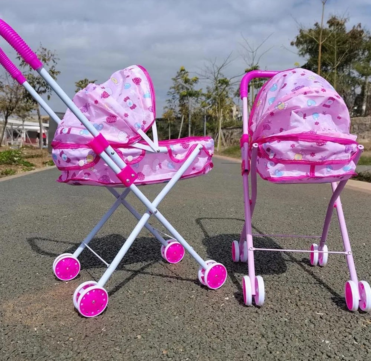 Foldable baby doll strollers image