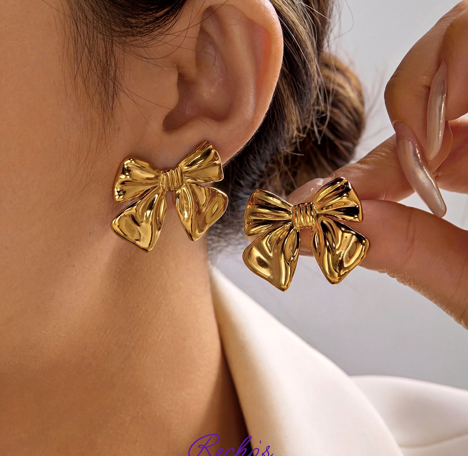 Gold bow earrings  image