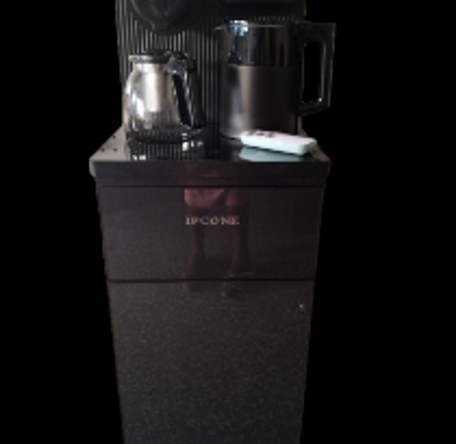 Water Dispenser. IPCONE Bottom Load Dispenser. Hot ,cold And Normal Features Woth A Kettle And A Coffee Maker Remote For Your Use At Your Confort. image