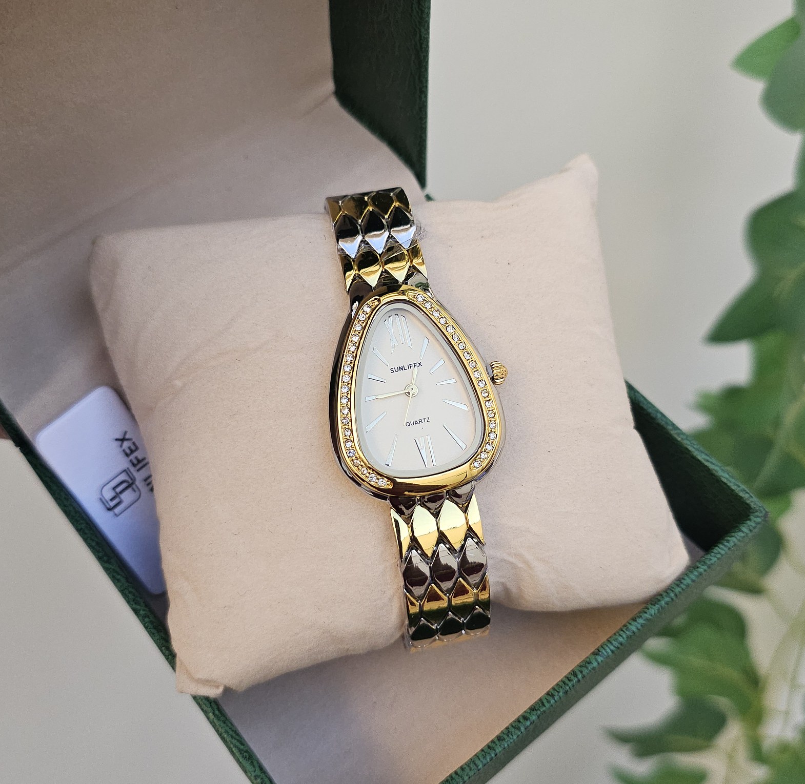 Mixed metal serpentine watch  image