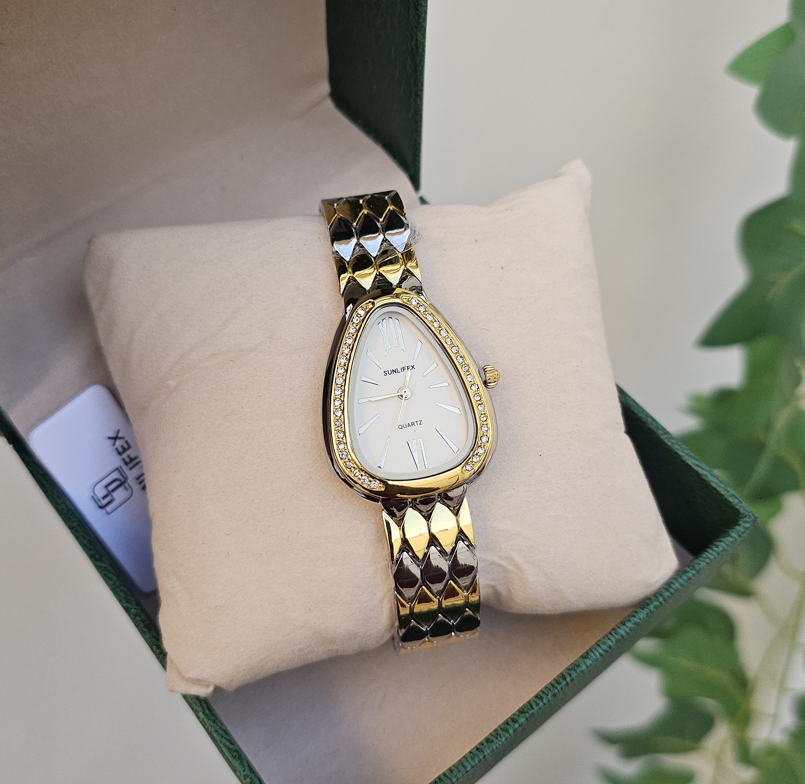 Mixed metal serpentine watch  image