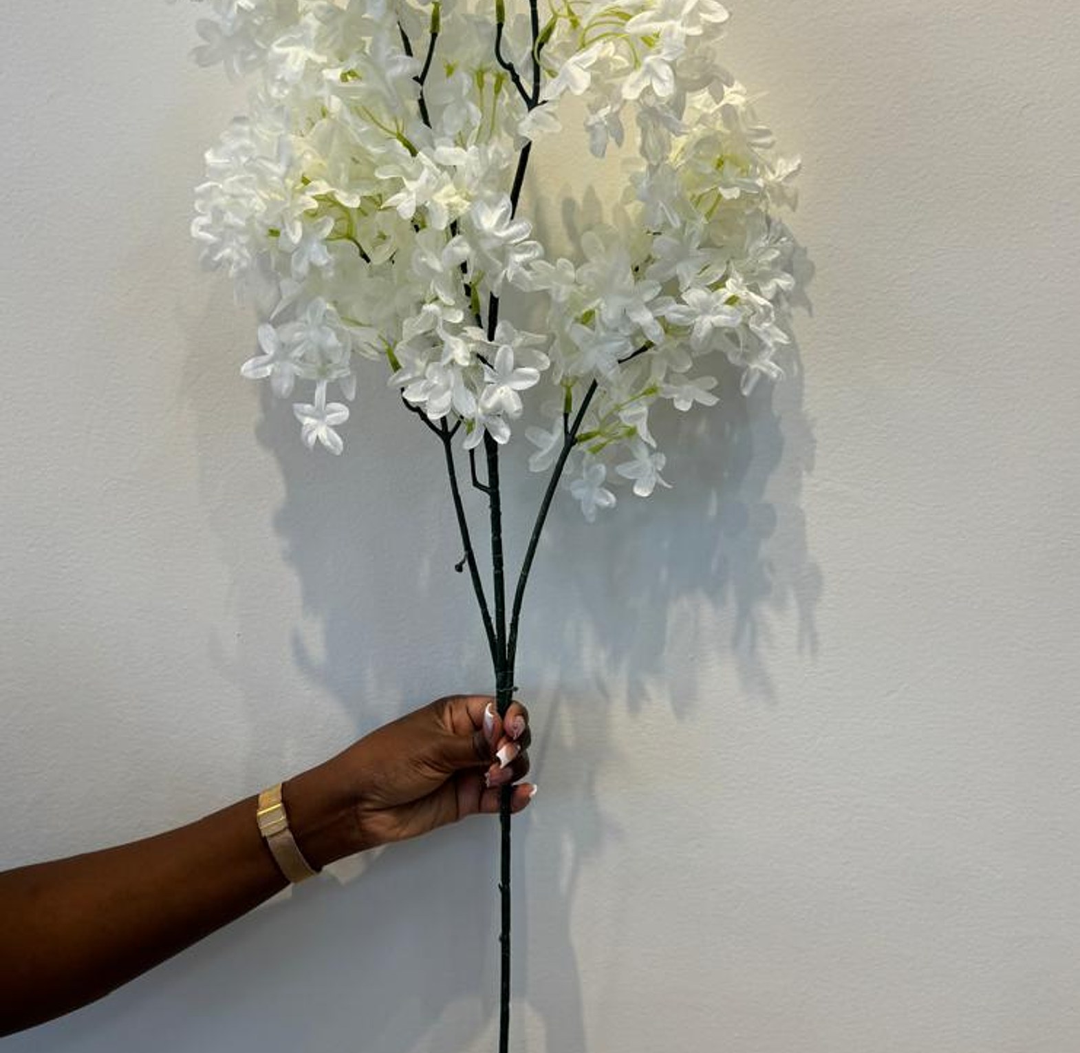  Faux lilac flowers.  image