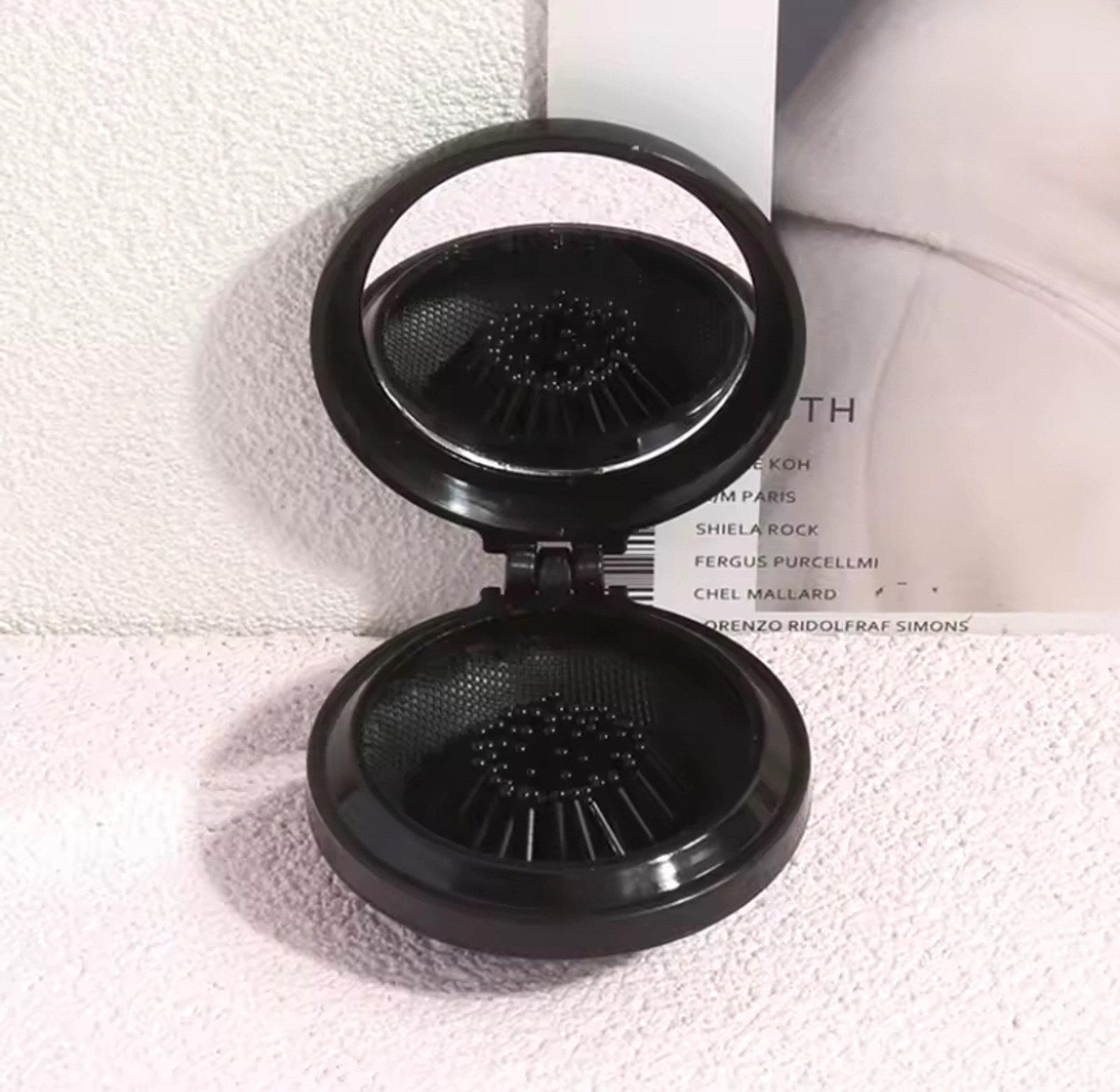 Mini pocket mirror with folding comb  image