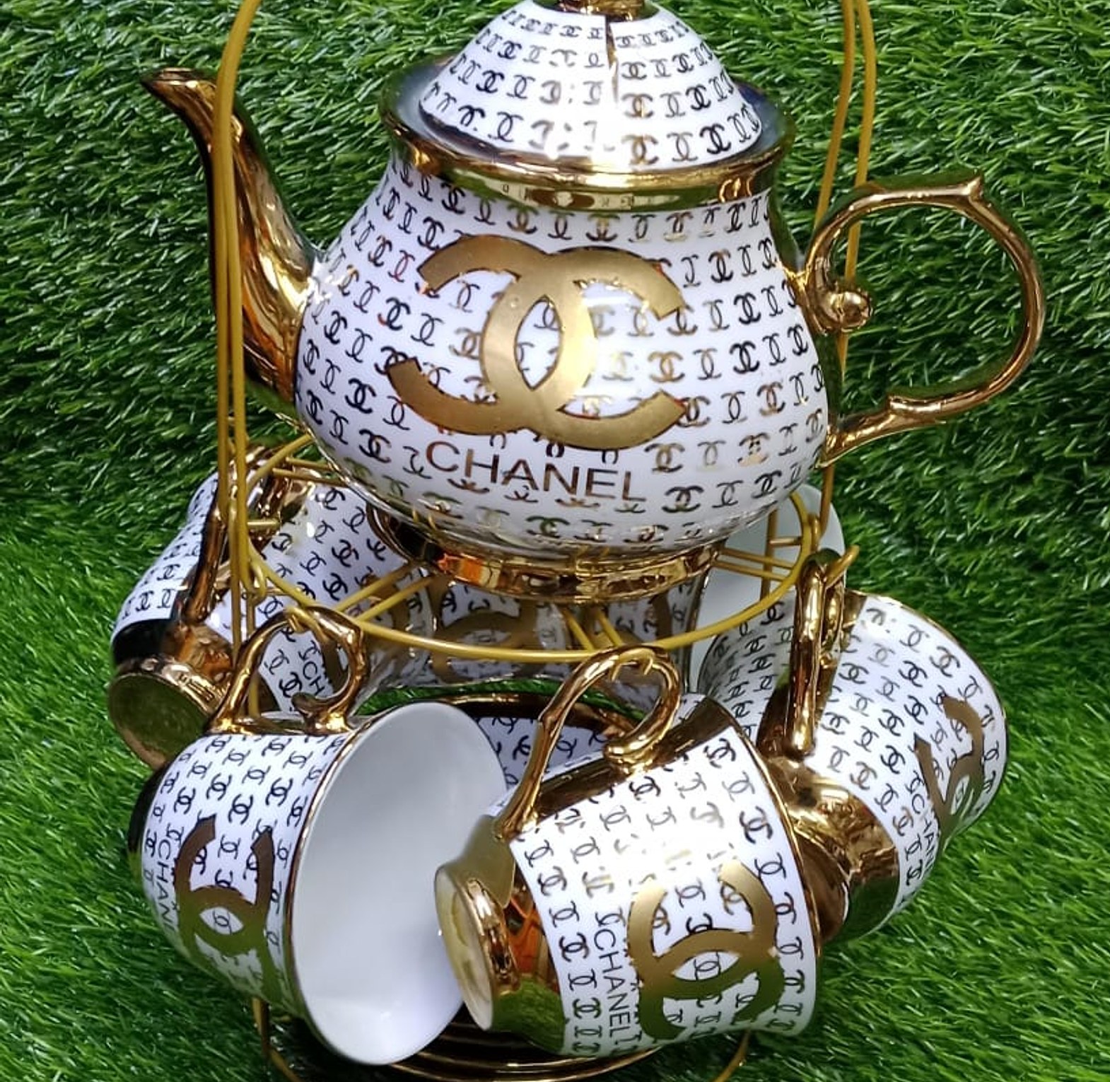 13pc Tea Set. Chanel-themed porcelain tea set.  image