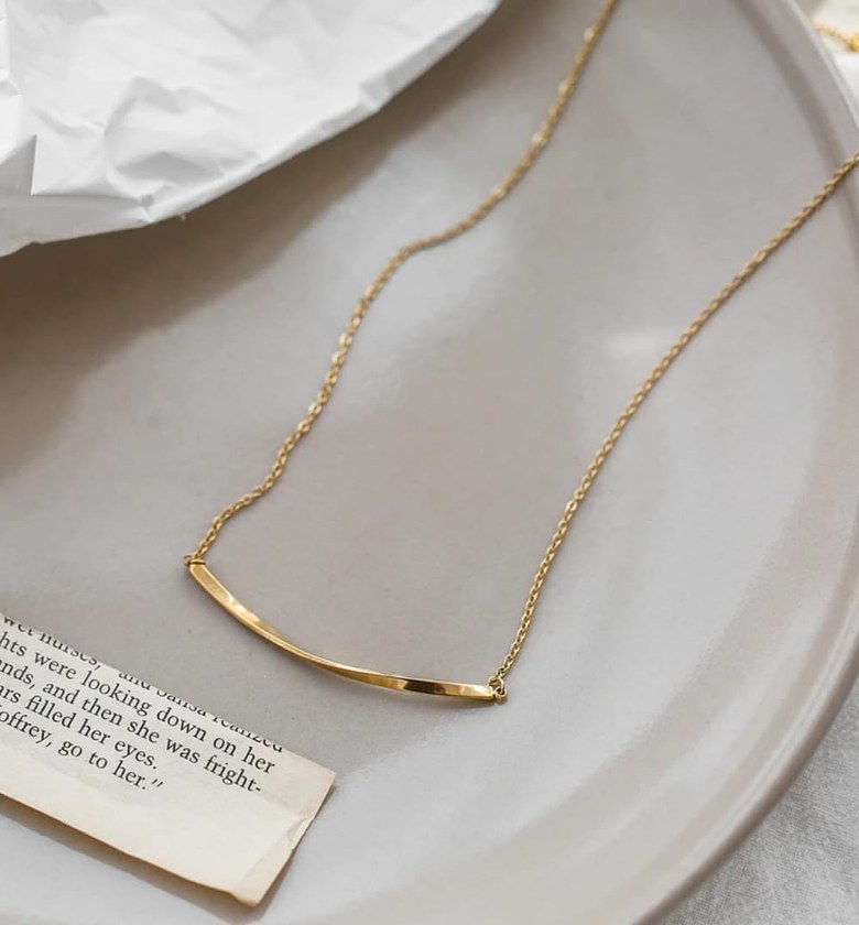 Long bended necklace image