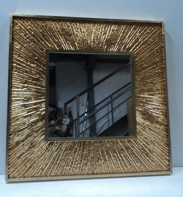 MIRROR WITH A GOLD FRAME  image