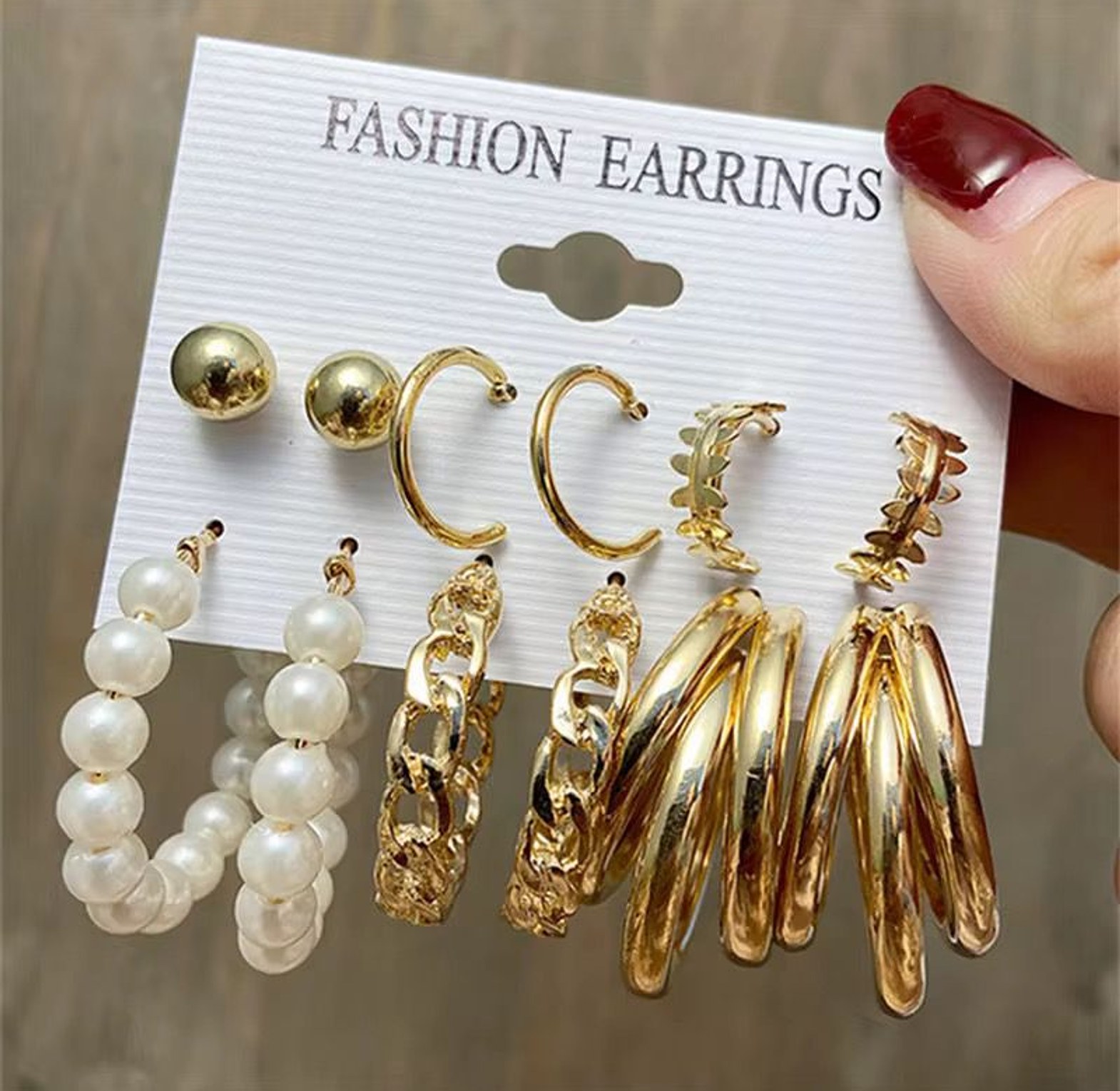 The Multi-Statement Gold-Tone Earring Collection image