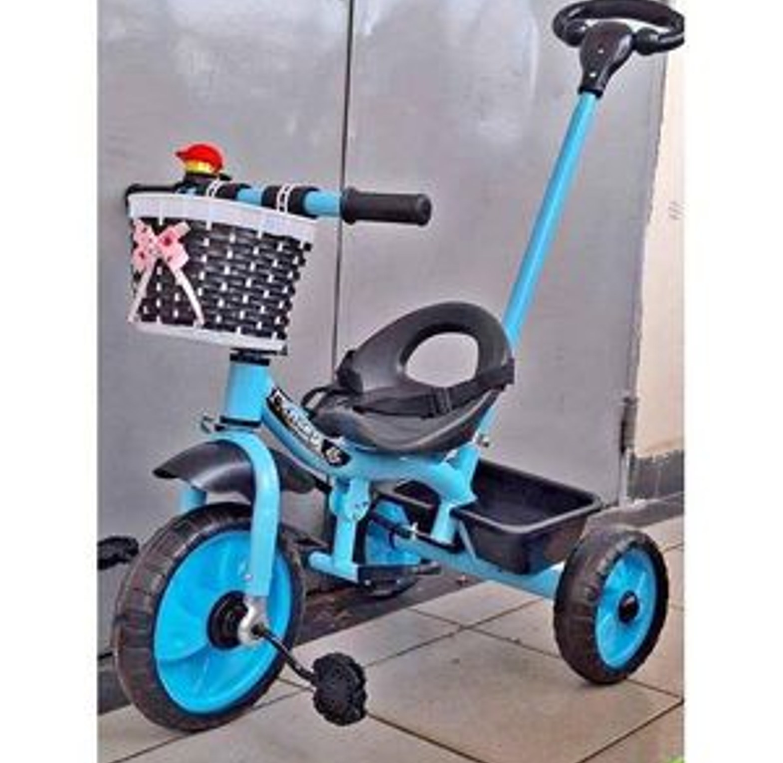 Tricycle.  KIDS TRICYLES WITH A PUSH HANDLE CHILDREN BICYCLES AGE 0 TO 4 YEARS With A Belt To Prevent  Your baby from Falling image
